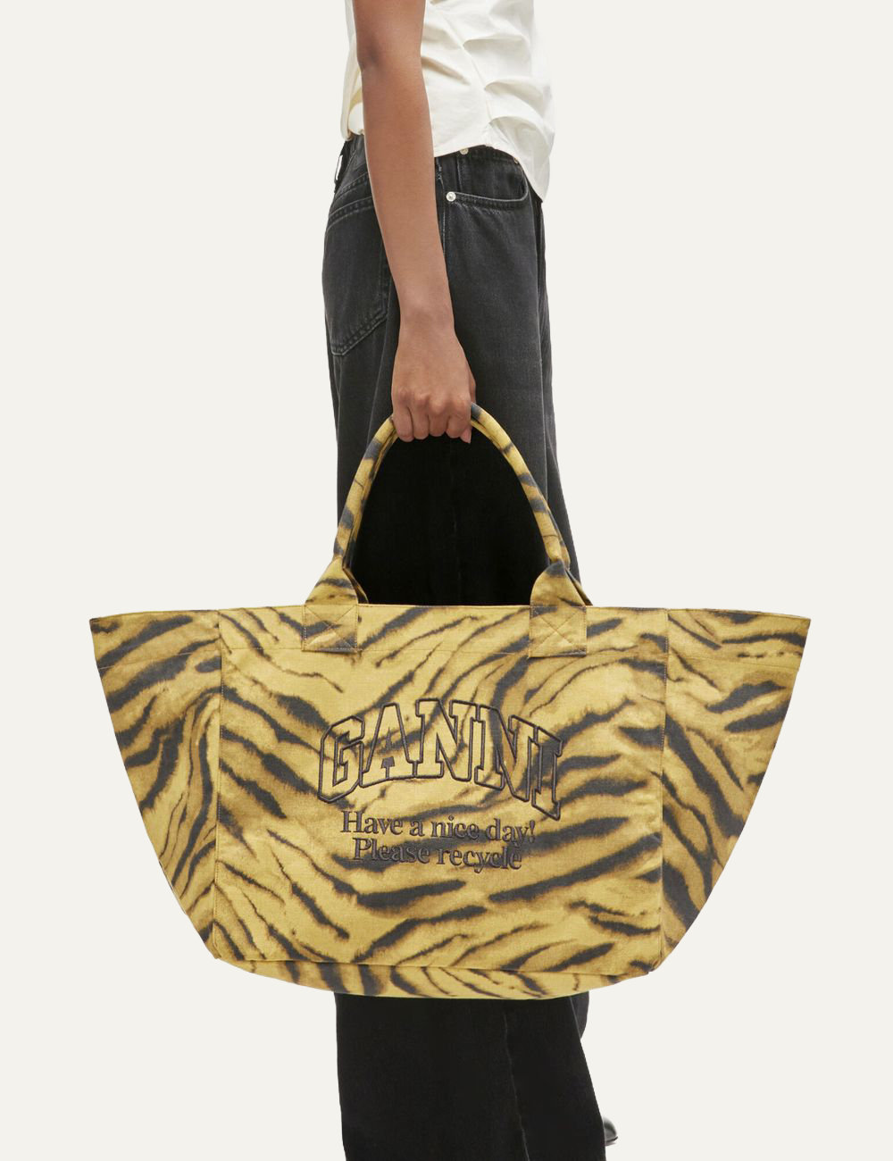 ganni shopper xl print zebra bag on model