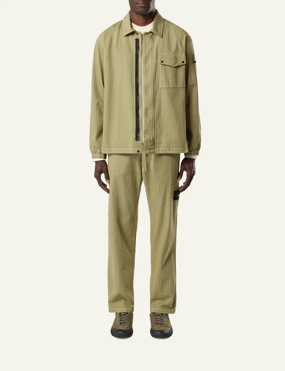 Men's Stone Island olive cotton herringbone chino trousers with Compass logo patch full body