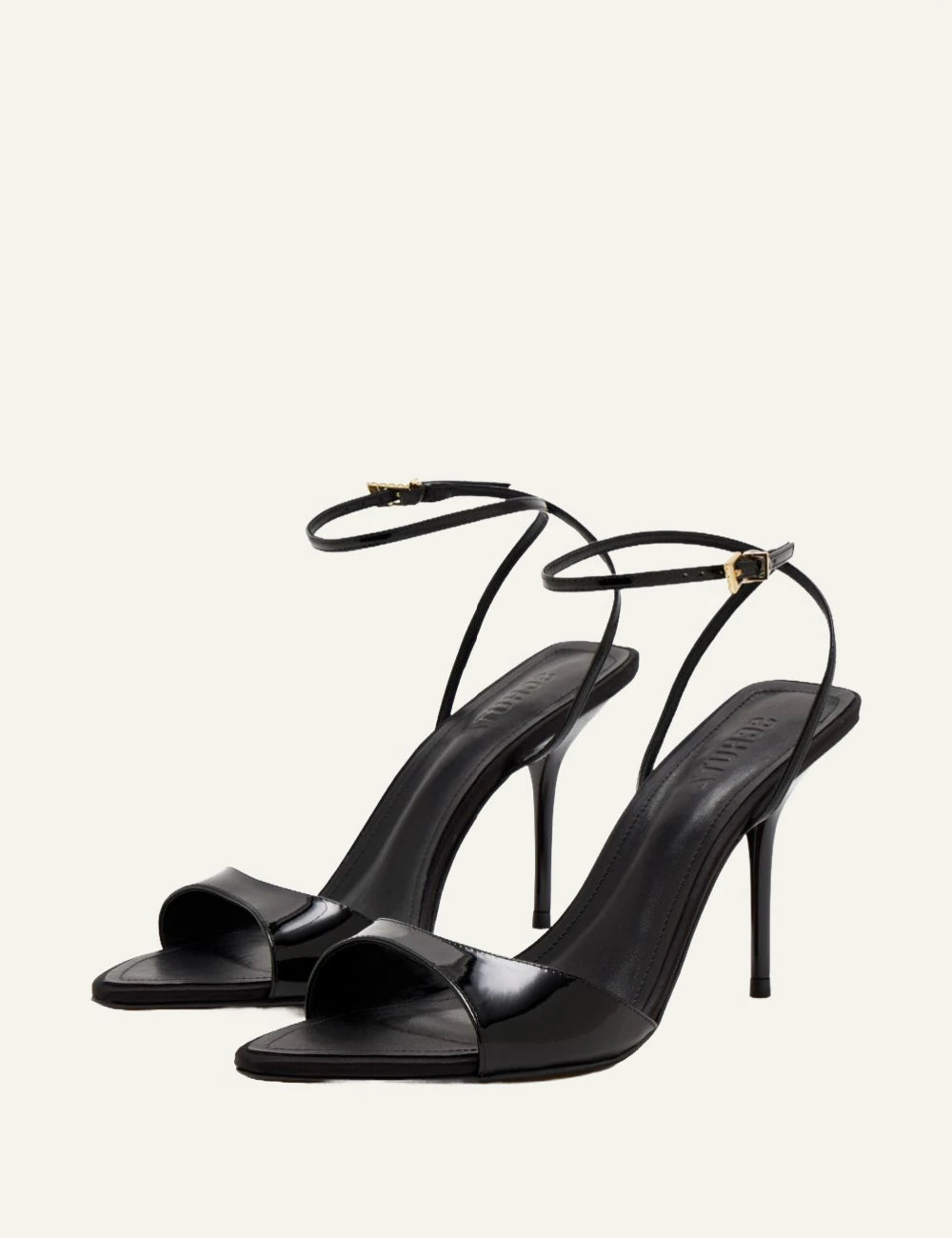 Schutz Elodie black patent leather stiletto sandal with ankle strap angled view