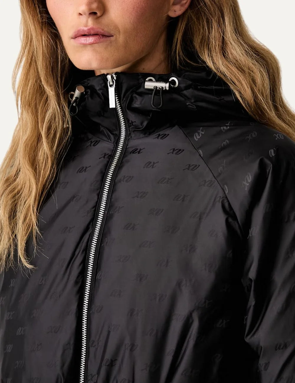 Armani Exchange women's black hooded jacket with all-over tonal logo print, silver-tone zip fastening and elasticated waist detail