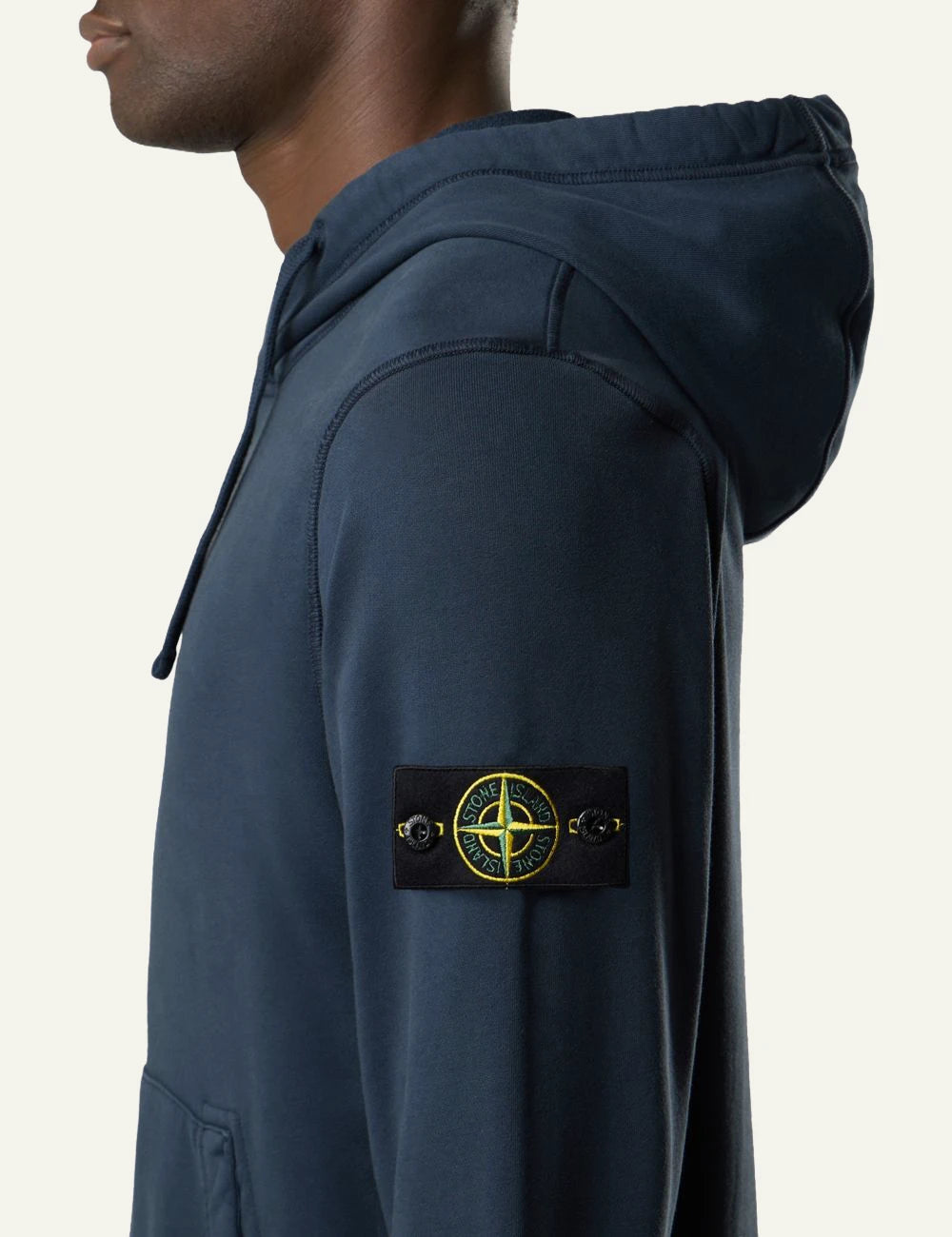 Men's Stone Island organic cotton fleece hoodie in navy blue with sleeve logo patch and kangaroo pocket side