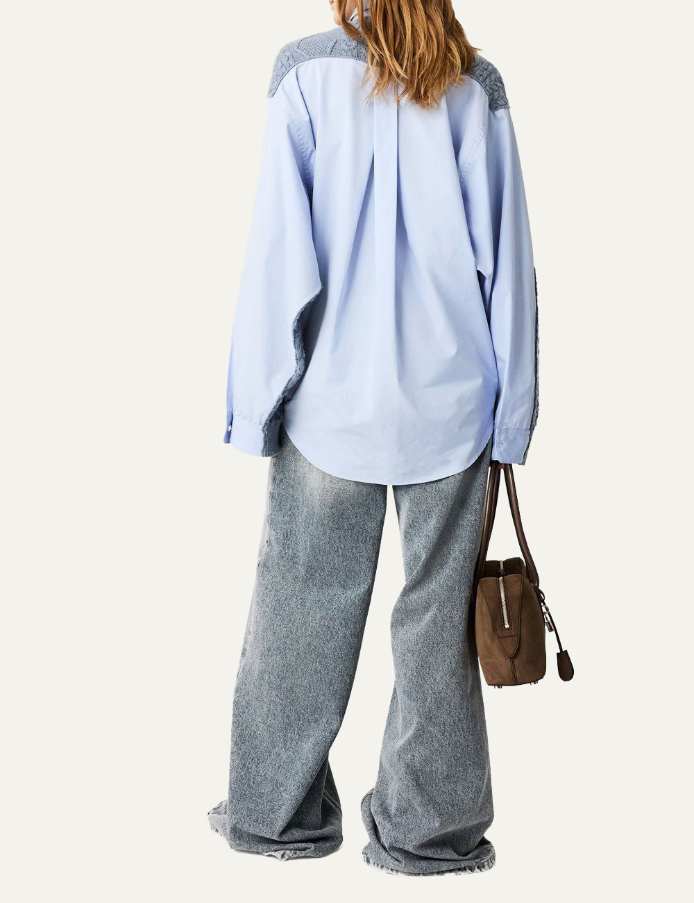 Stella McCartney wide-leg jeans back view worn, washed blue denim