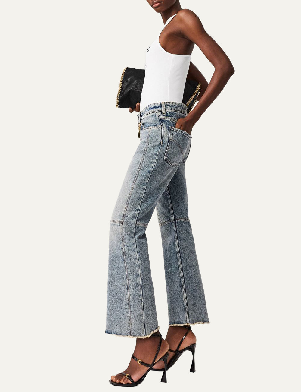 Stella McCartney wide leg jeans side view worn, vintage wash denim