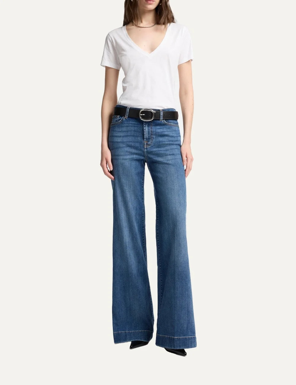 7 For All Mankind women light wash high-rise wide flare jeans with subtle whiskering and faded details full body
