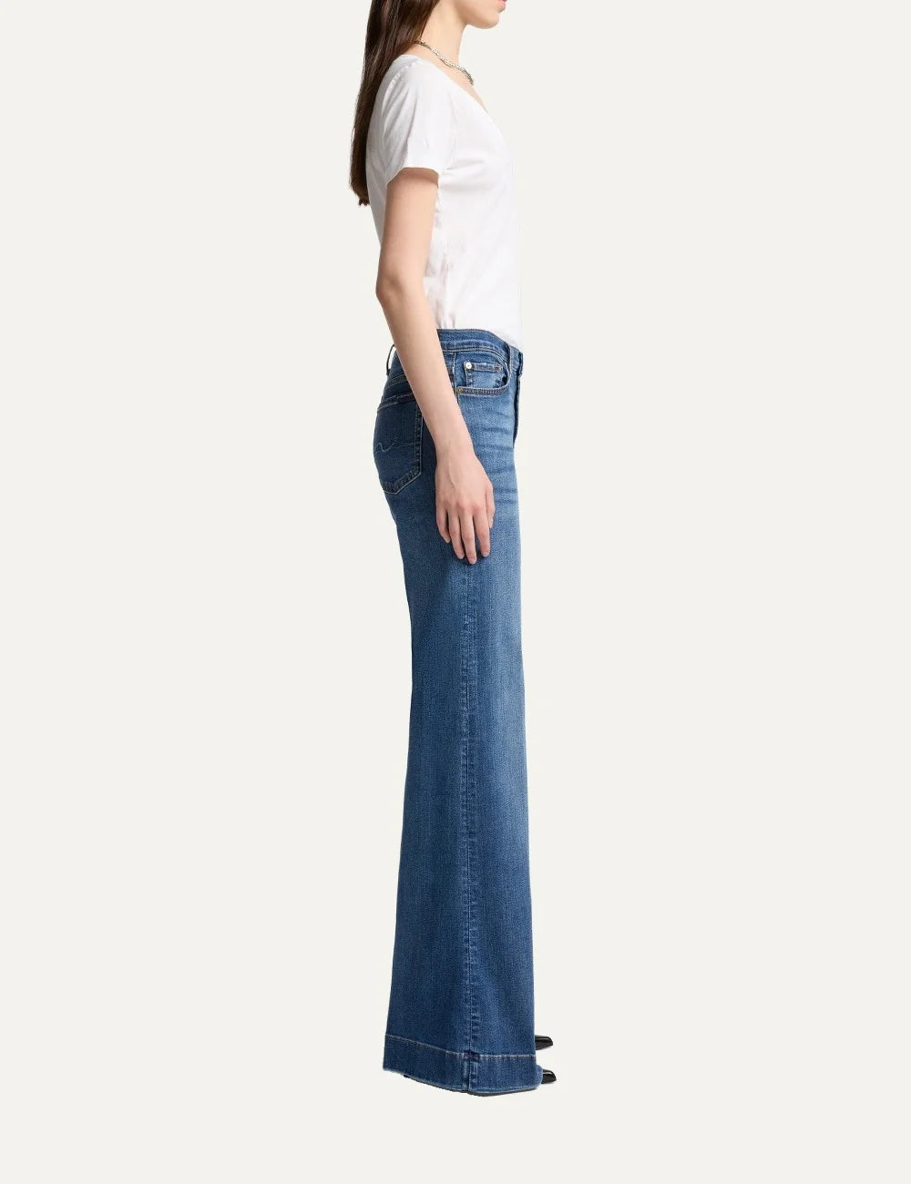 7 For All Mankind women light wash high-rise wide flare jeans with subtle whiskering and faded details side