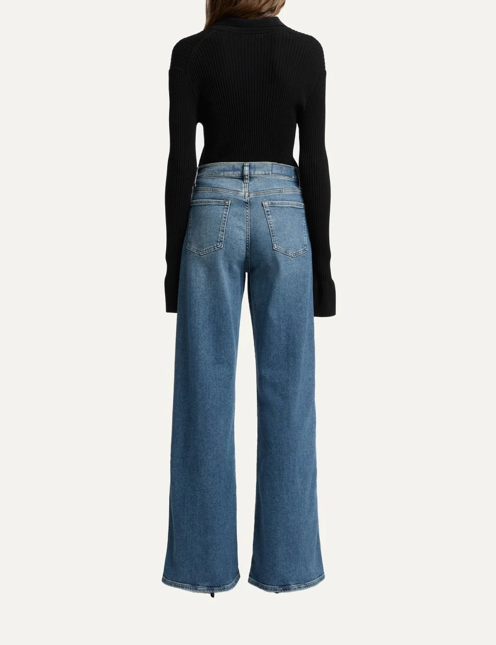 7 For All Mankind women medium wash high-rise wide-leg jeans with subtle whiskering and faded details back