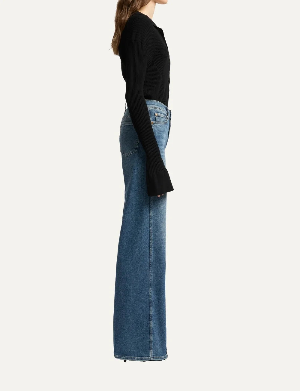 7 For All Mankind women medium wash high-rise wide-leg jeans with subtle whiskering and faded details side