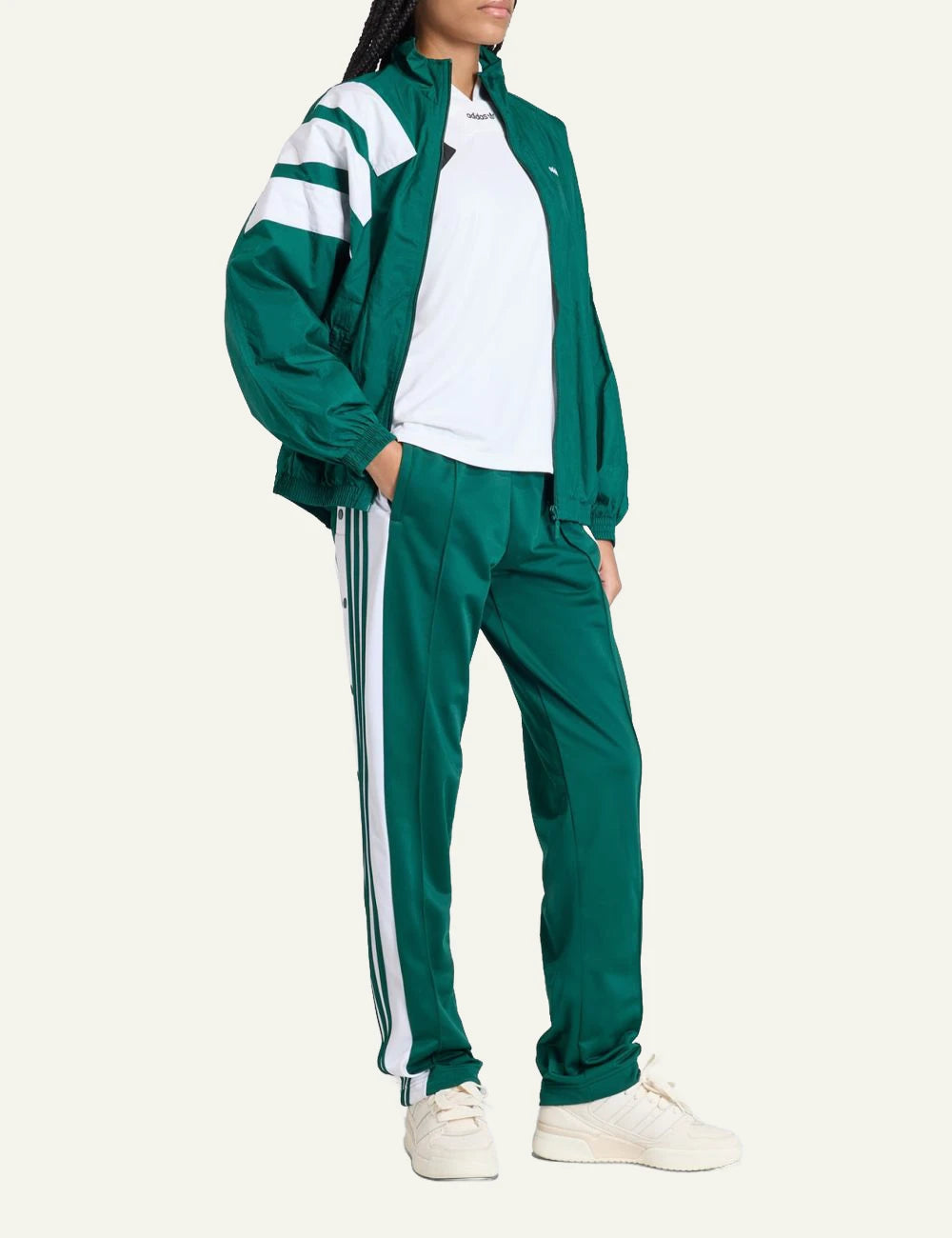 adidas adibreak green wide leg track pants collegiate green side full body view