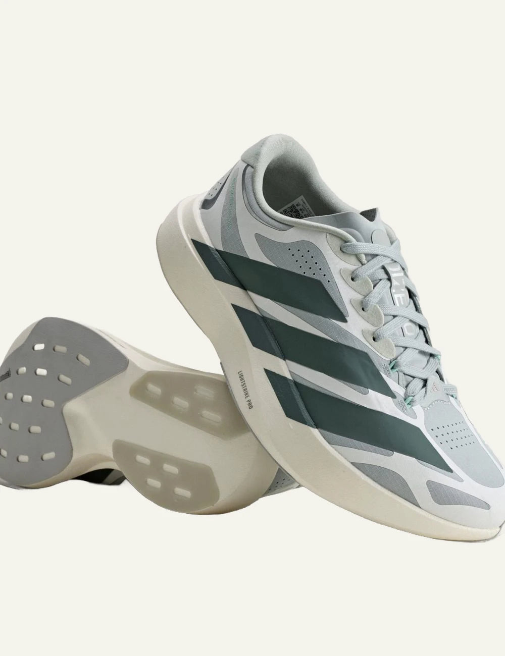 adidas Originals Adizero Evo SL EXO running shoes in Wonder Sage with Legend Ivy details profile