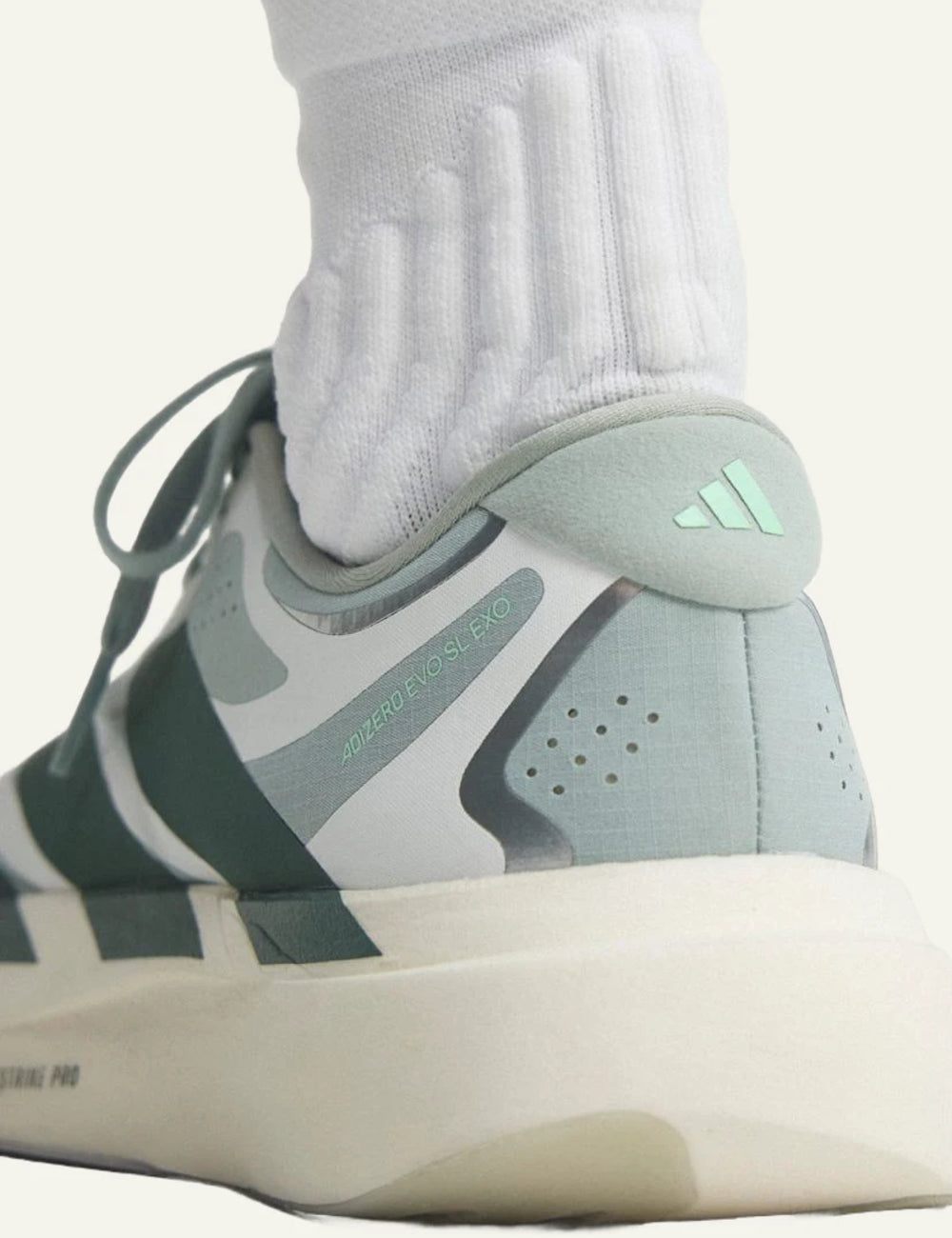 adidas Originals Adizero Evo SL EXO running shoes in Wonder Sage with Legend Ivy back