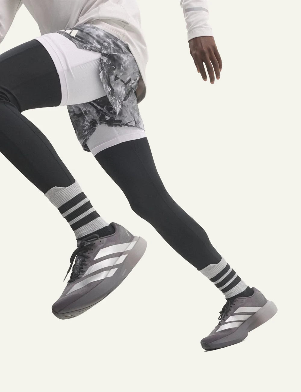 Women's adidas Originals Adizero EVO SL grey running sneakers with LIGHTSTRIKE PRO midsole model