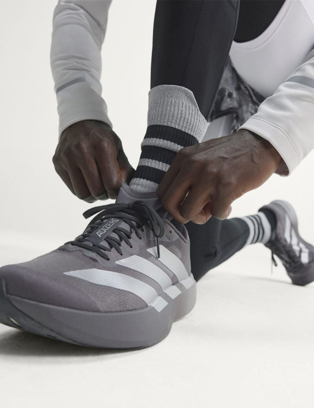 Women's adidas Originals Adizero EVO SL grey running sneakers with LIGHTSTRIKE PRO midsole front
