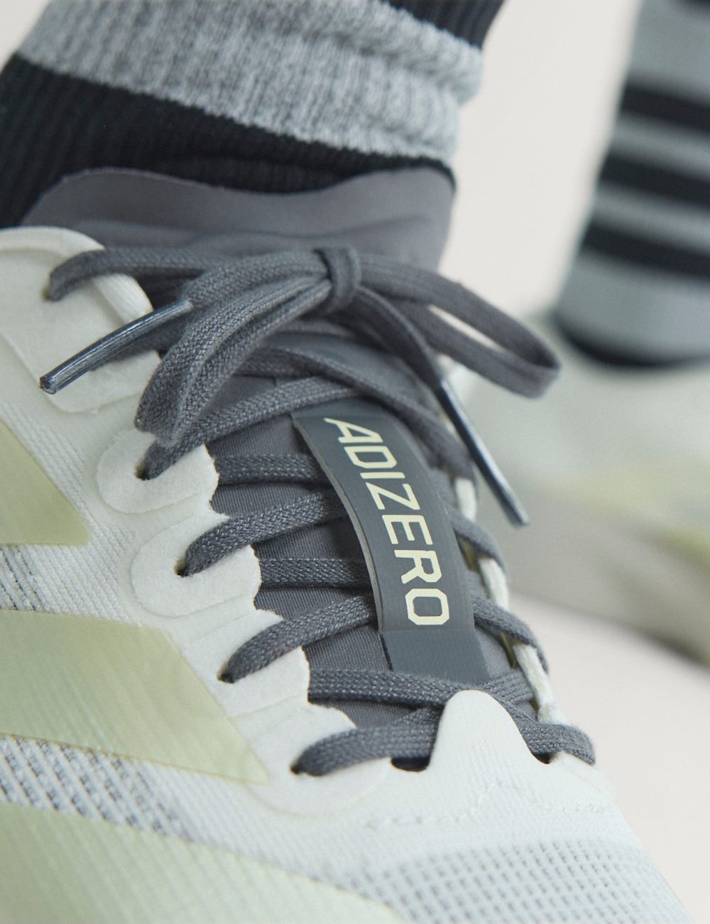 Women's adidas Originals Adizero EVO SL off white running sneakers with LIGHTSTRIKE PRO midsole detail