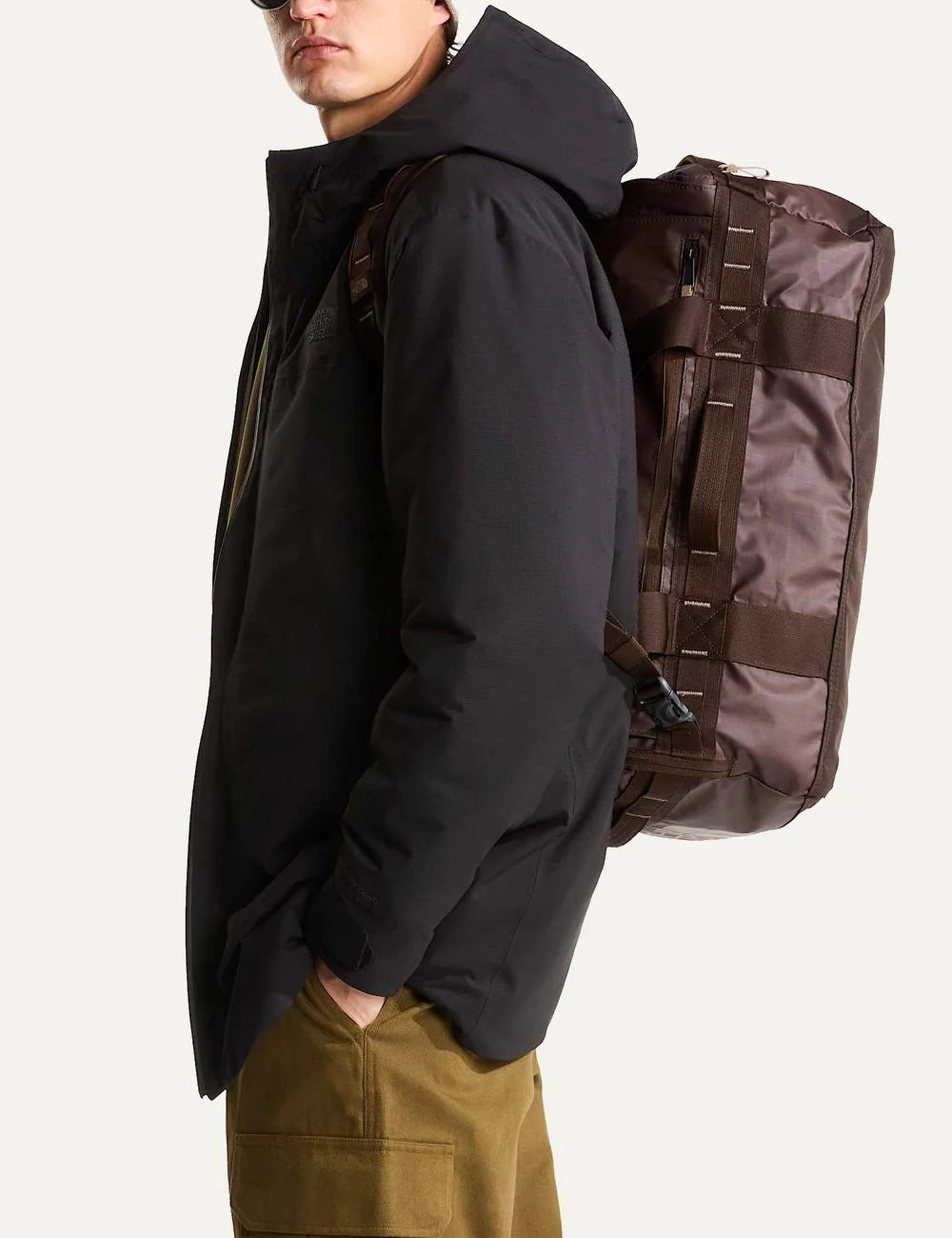 The North Face Base Camp Voyager 42L Dark Chestnut Garnet travel duffel bag with backpack straps and 15-inch laptop sleeve model