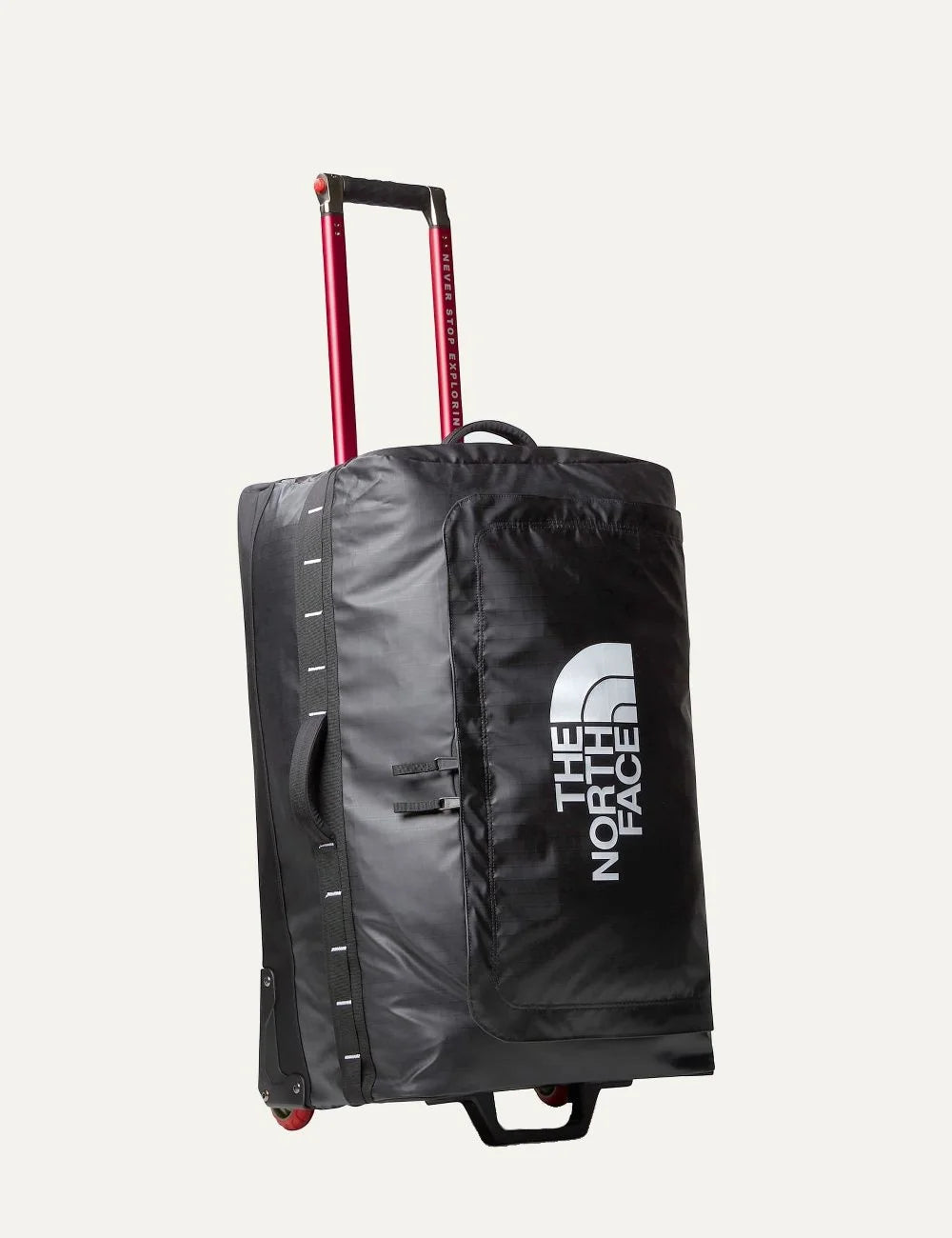 The North Face Base Camp Voyager Roller 29 black rolling travel suitcase with white logo, red telescopic handle and two wheels