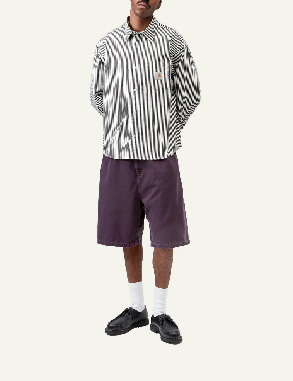 Full outfit with Carhartt WIP Daldry Shirt black/wax stripe, styled with purple shorts for casual streetwear look.