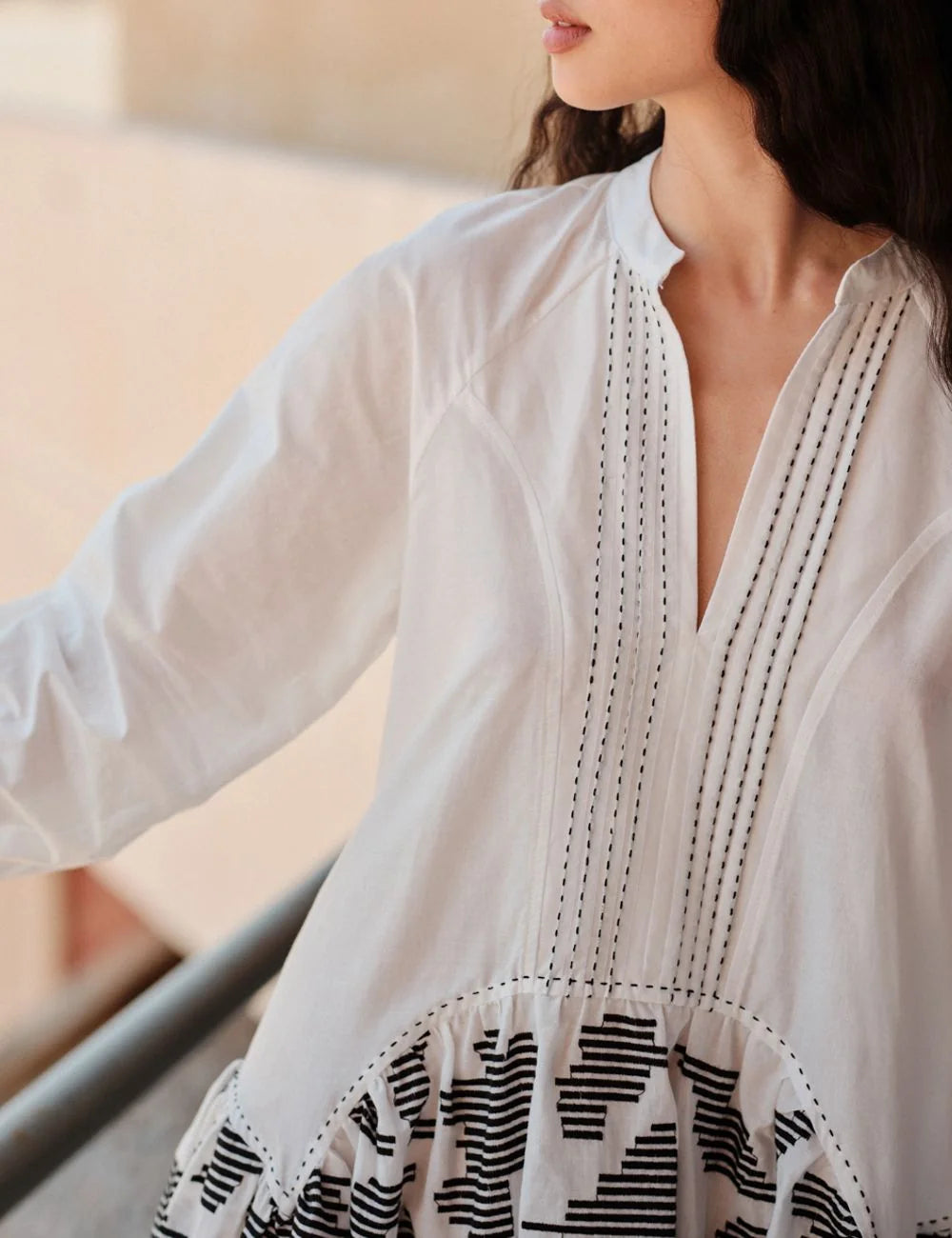 Devotion Zephyra white boho mini dress with embroidery front detail close view