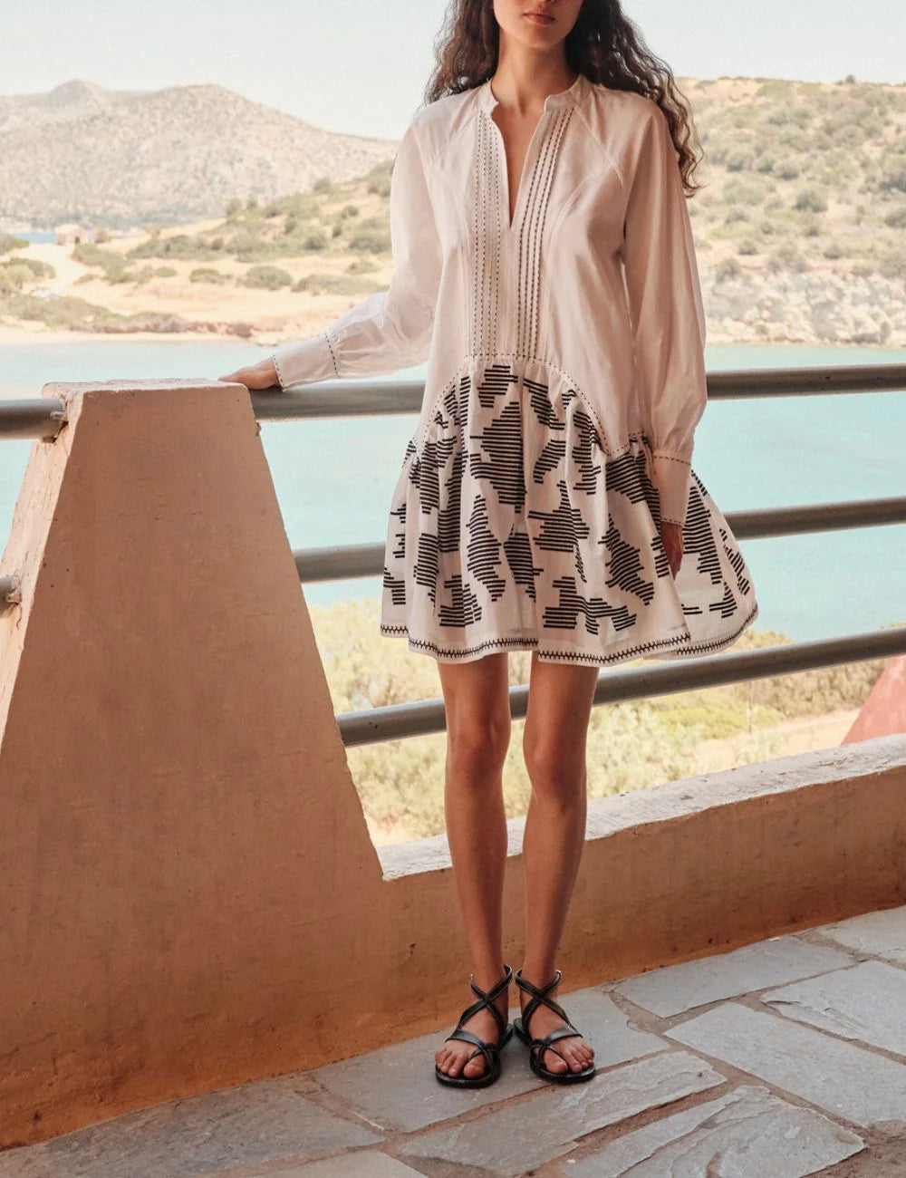 Devotion Zephyra white mini dress boho look full body seaside view