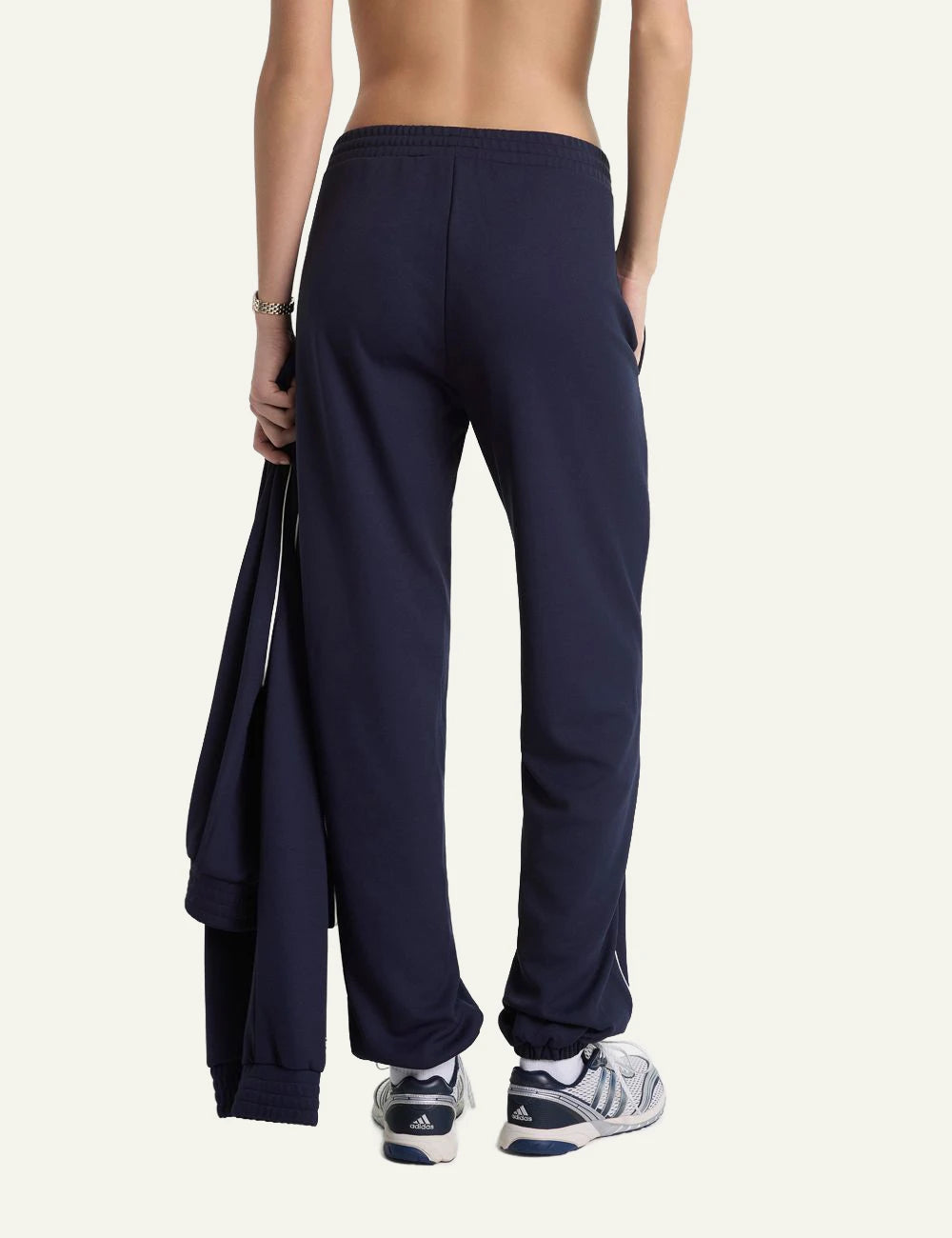 Sporty and Rich NY logo track pants navy back