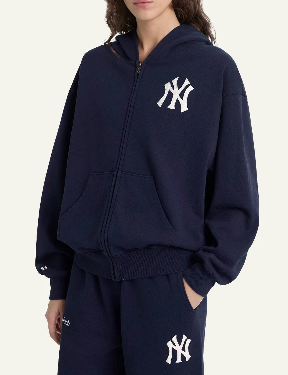 Sporty and Rich NY Yankees navy zip hoodie front model view
