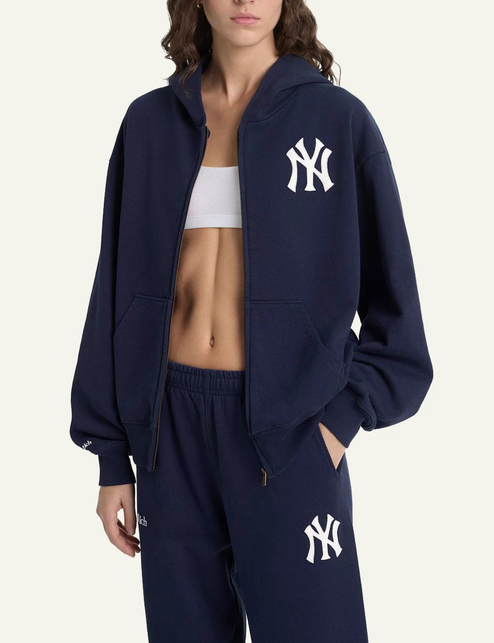 Sporty and Rich NY Yankees navy sweatpants relaxed fit model