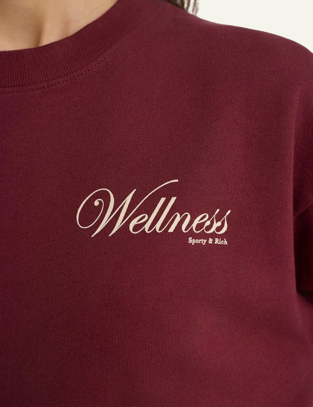 Sporty and Rich wellness crewneck sweatshirt merlot front detail view