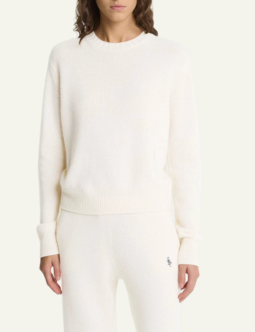 Sporty and Rich cashmere wool wide leg pants ecru front model view
