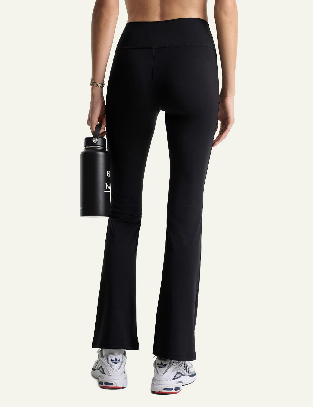 Sporty and Rich black flared leggings back view