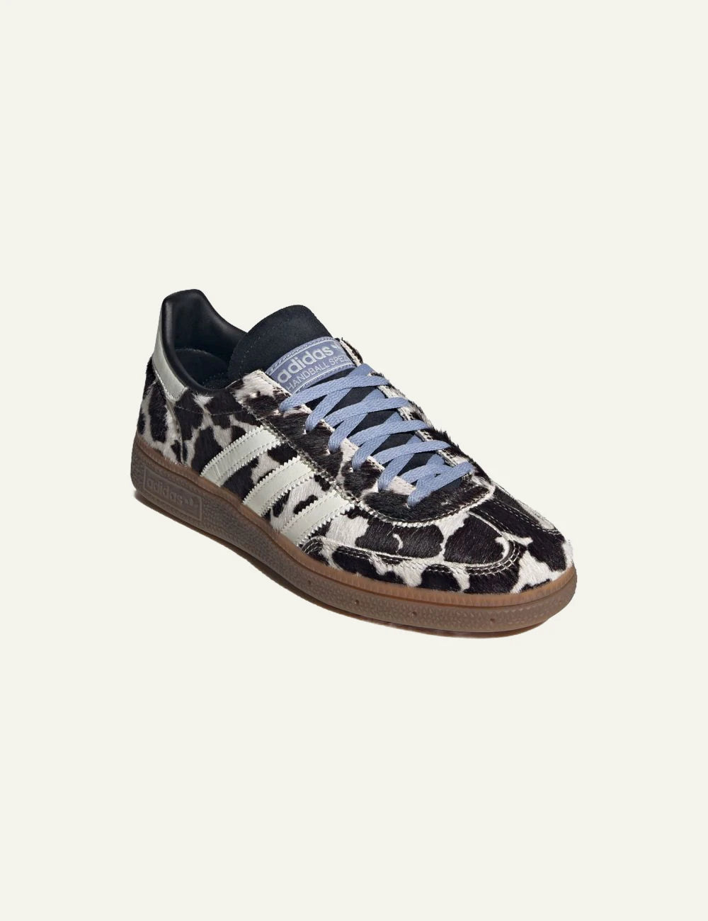 Women's Adidas Originals Handball Spezial sneakers in black and off white animal print with gum sole angled