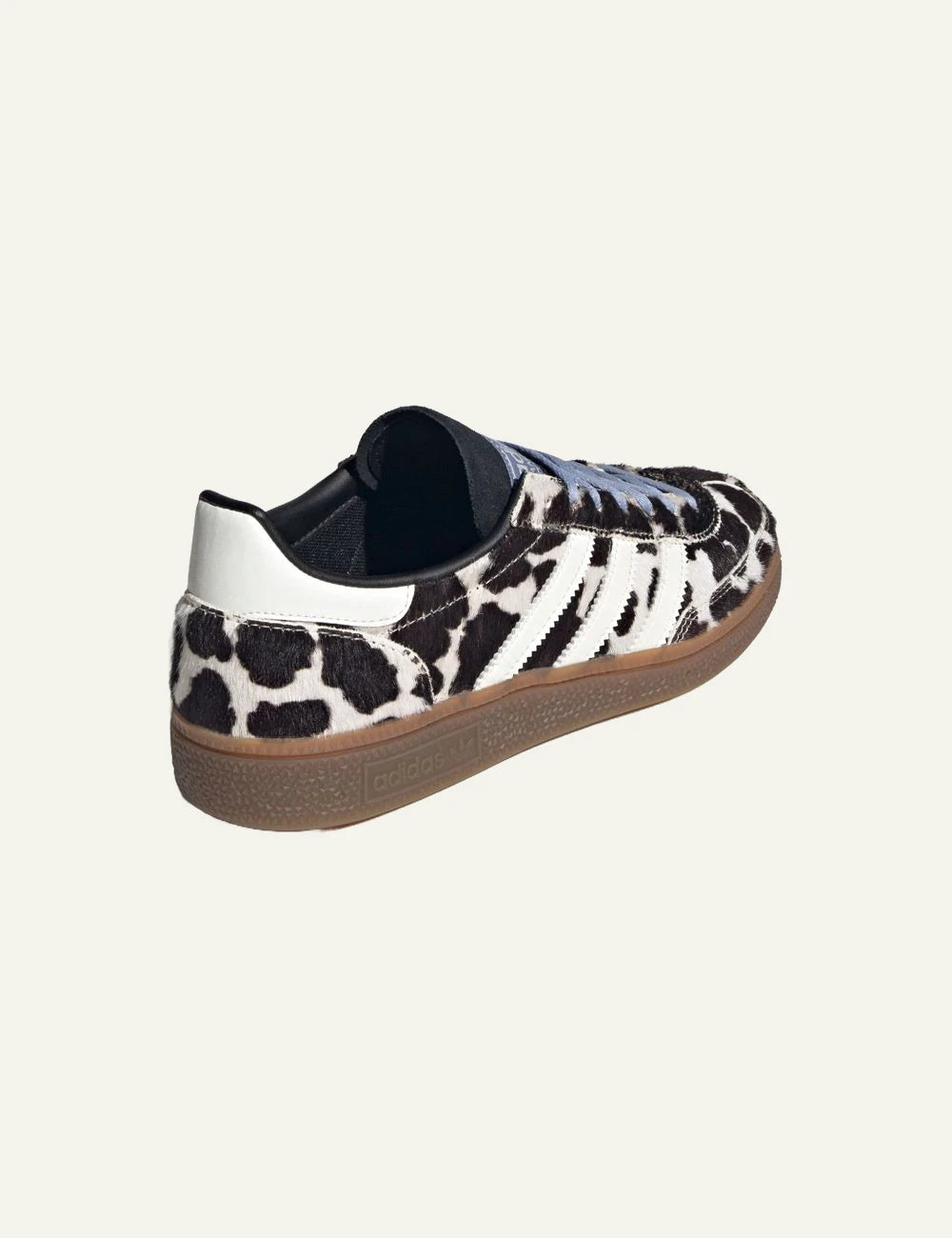 Women's Adidas Originals Handball Spezial sneakers in black and off white animal print with gum sole back