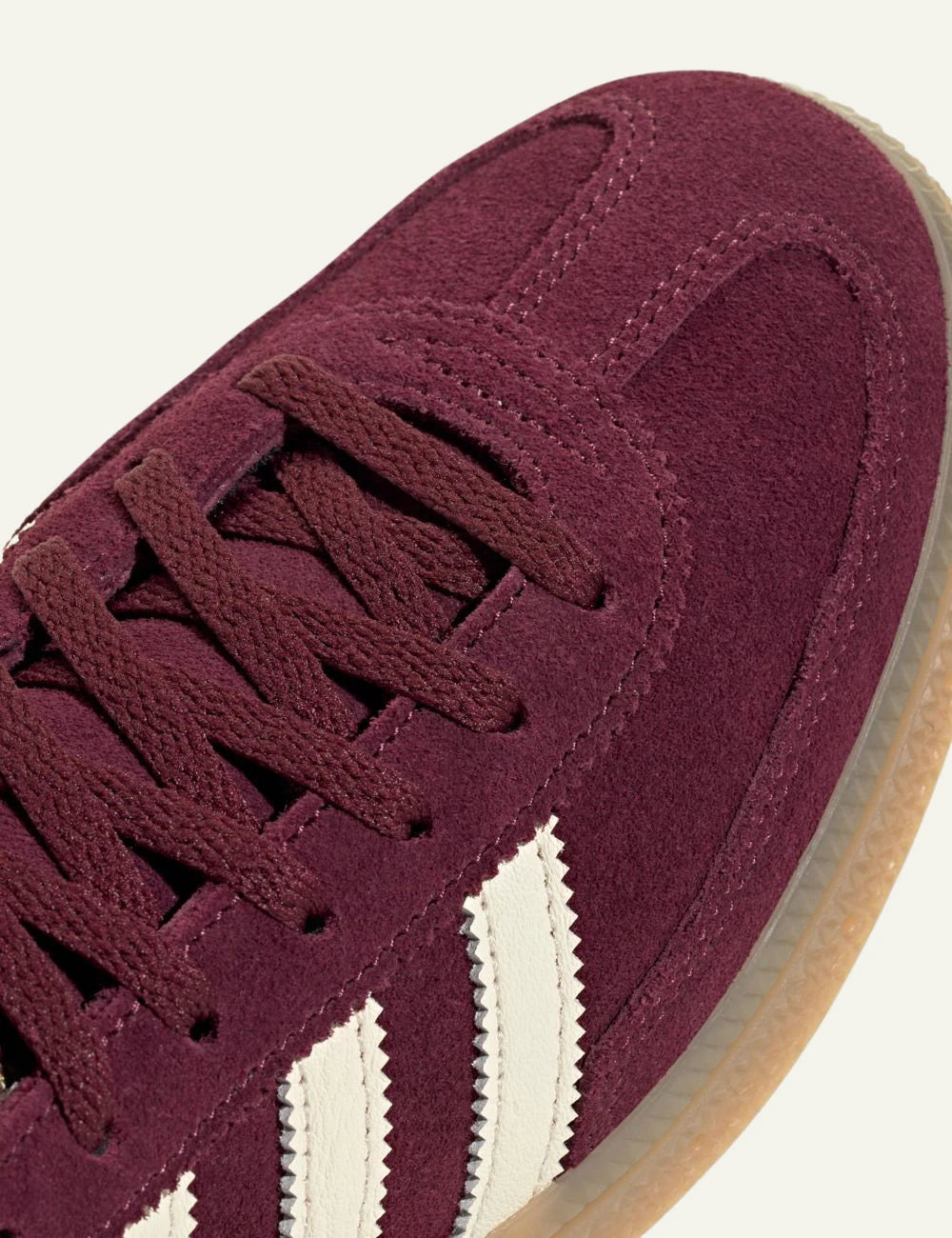 Women's adidas Originals Handball Spezial burgundy suede sneakers with cream leather stripes and gum sole angled