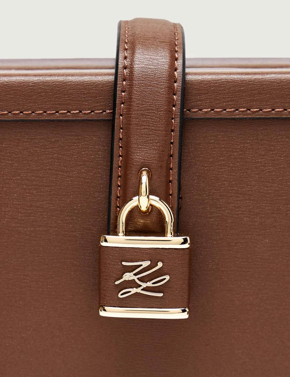 Karl Lagerfeld padlock hardware close-up brown leather