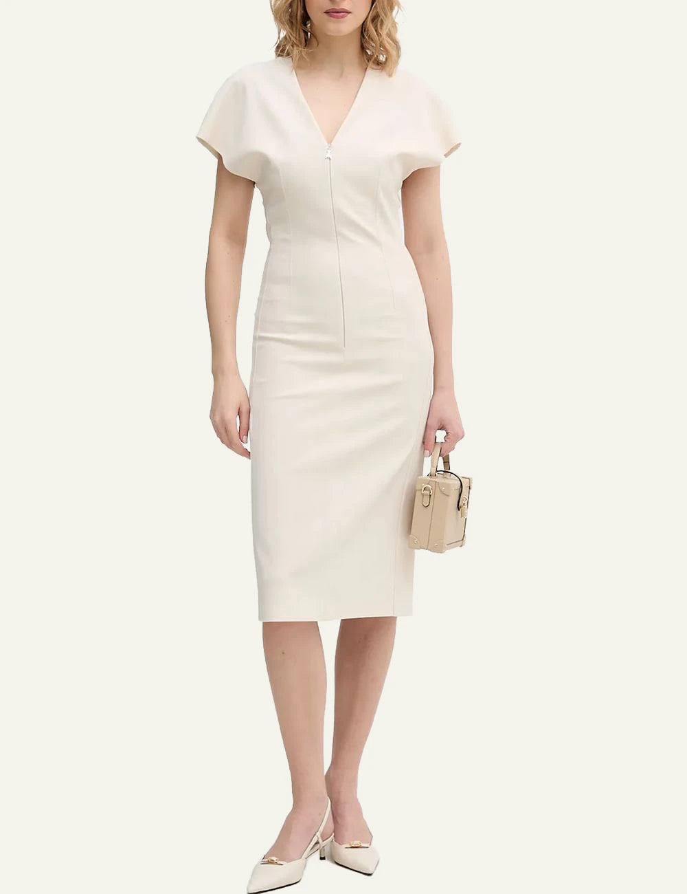 Model wearing Karl Lagerfeld safari trunk bag worn crossbody model outfit