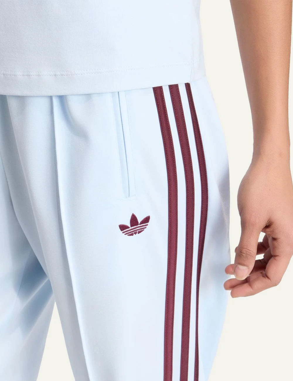 adidas firebird track pants crystal sky maroon stripes logo view