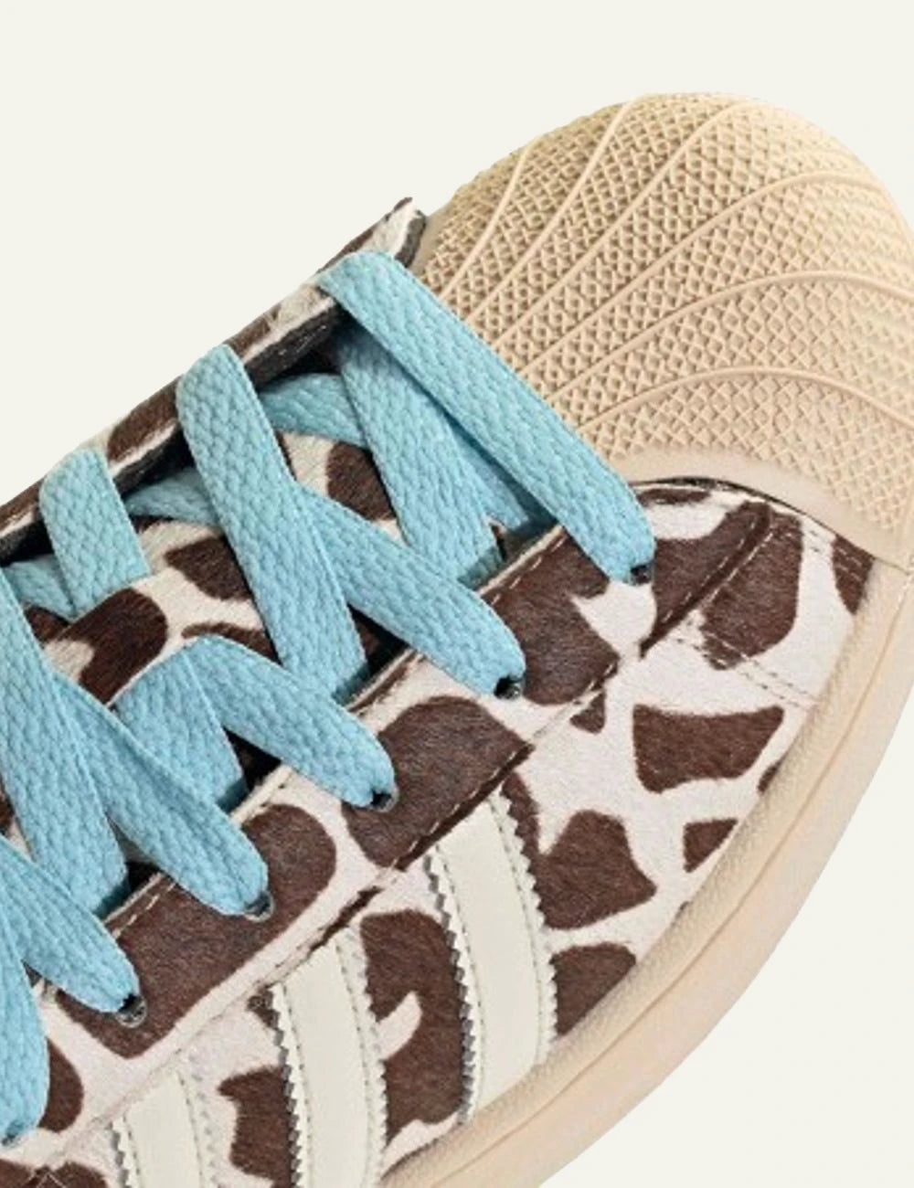 Adidas Originals Superstar II W crystal linen animal print blue laces angled view