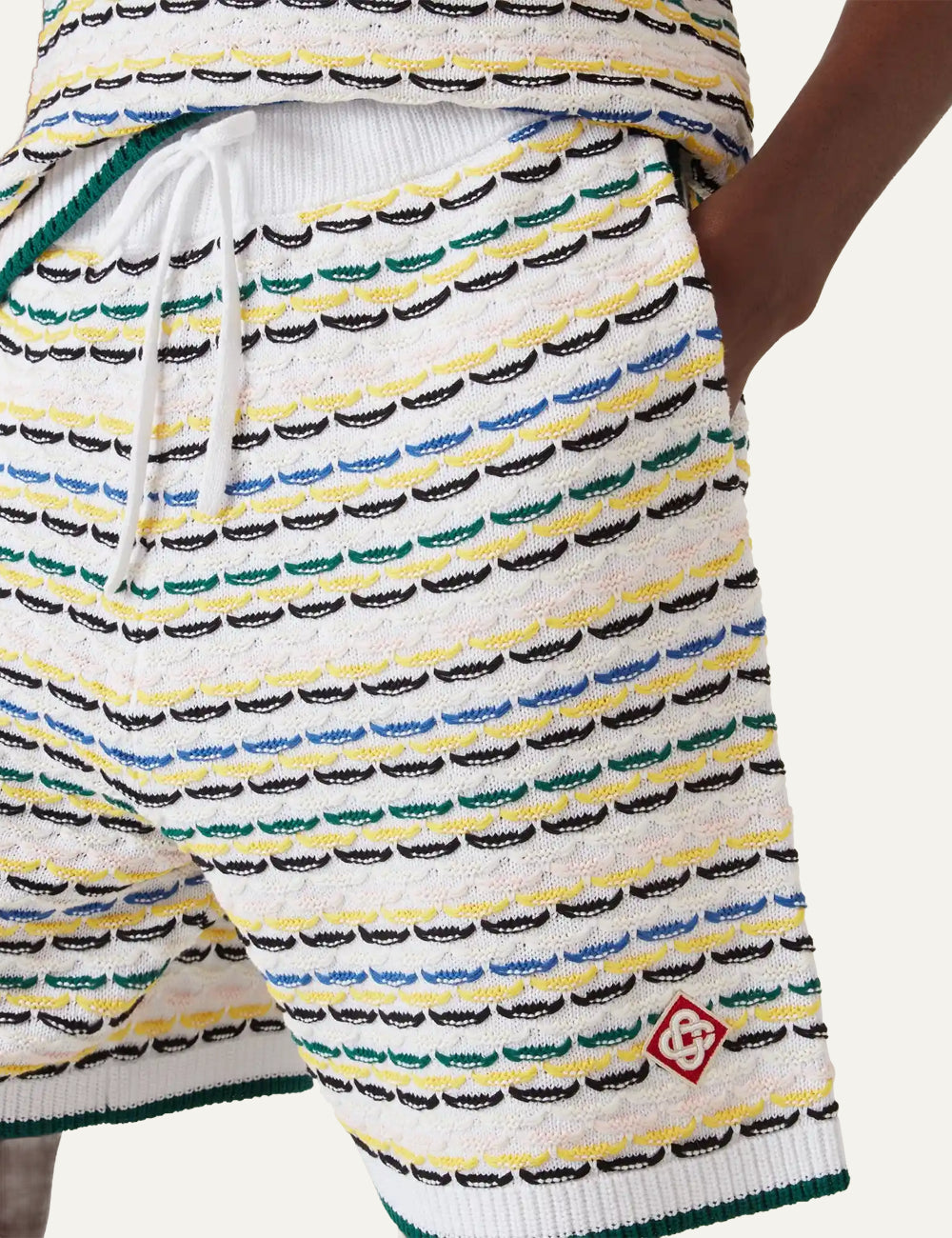 Λεπτομέρεια Casablanca diamond logo patch σε knit cotton shorts