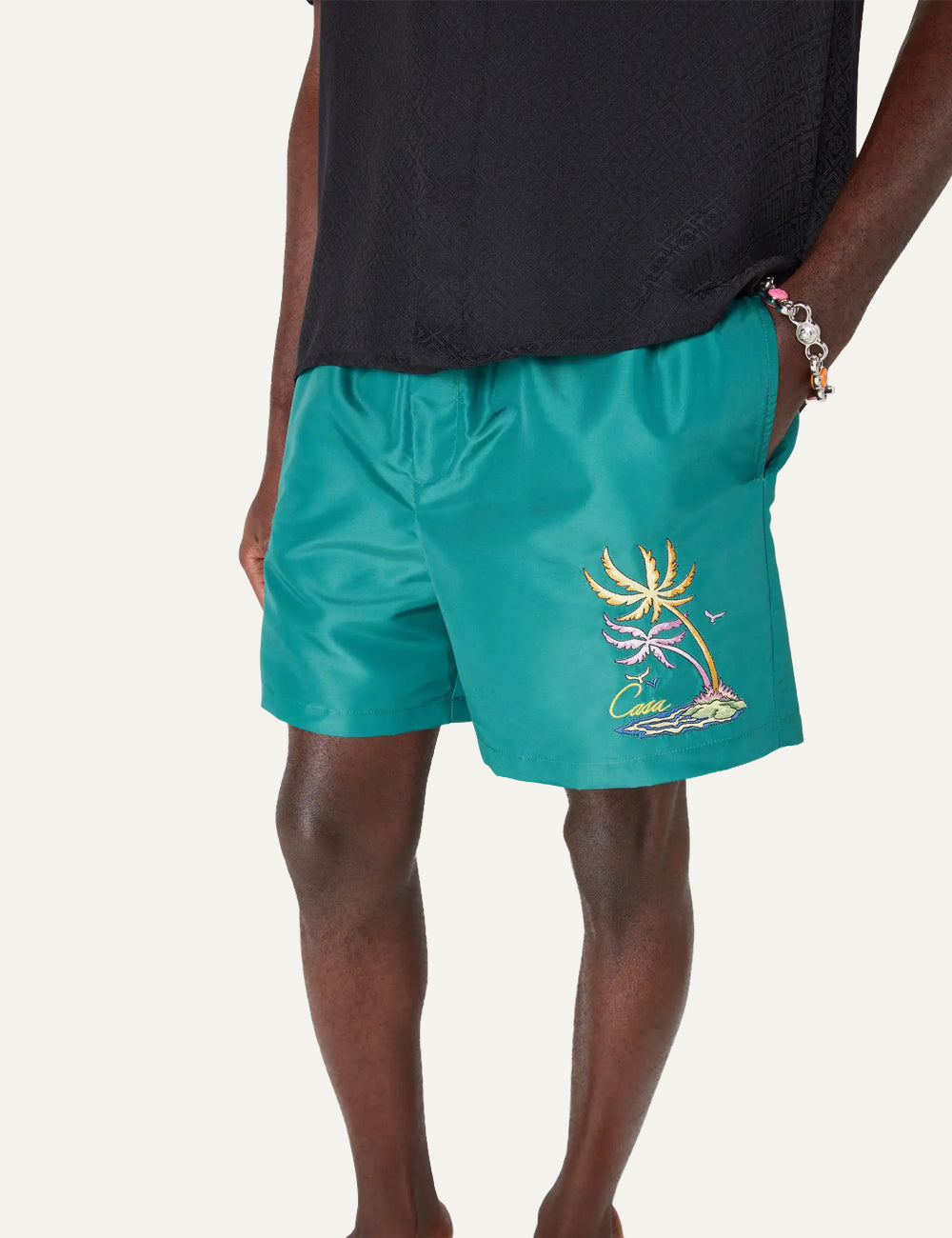 Casablanca men swimwear green swim shorts tropical embroidery close up
