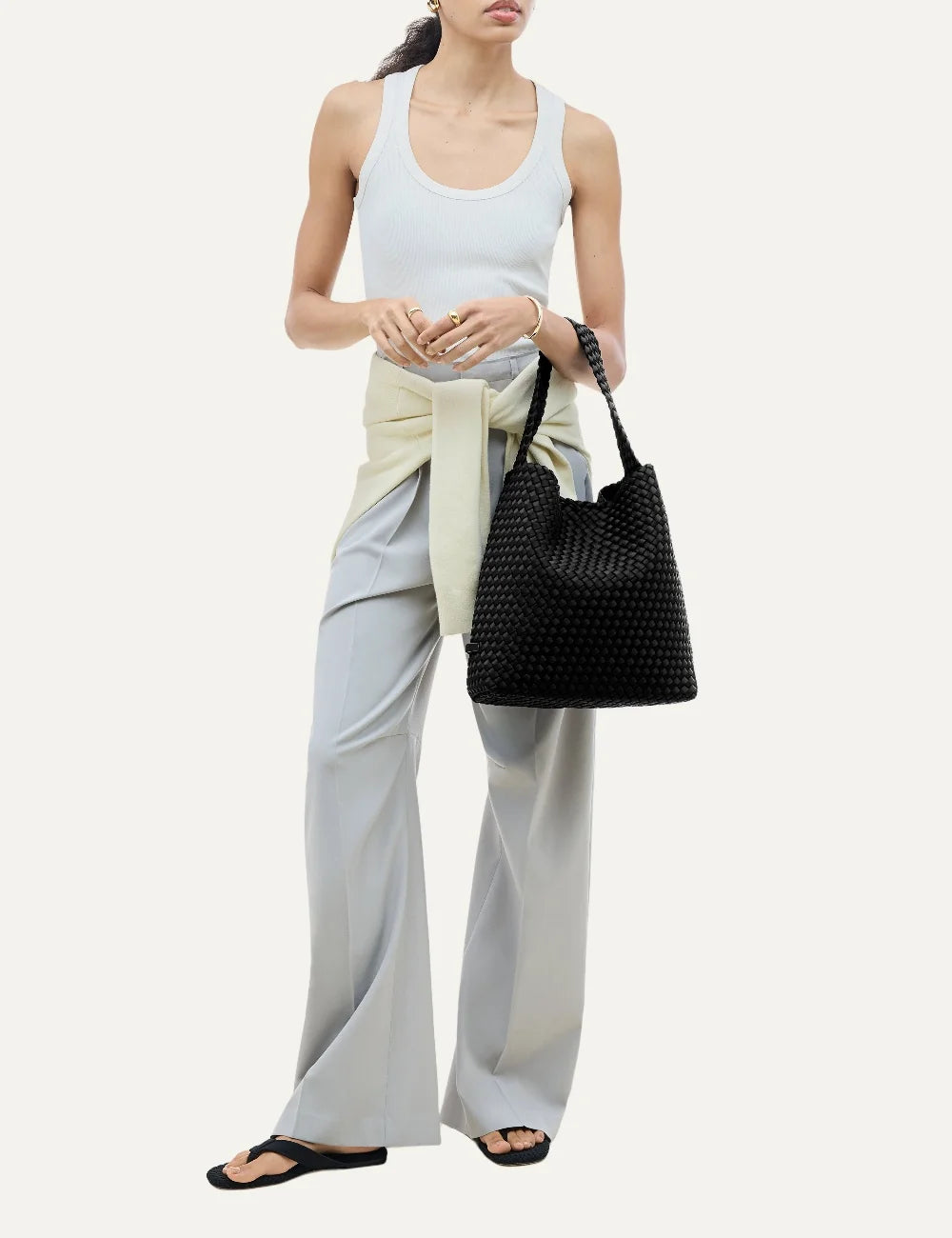 Women's Naghedi Nomad Medium Hobo bag in Onyx black handwoven neoprene with wide shoulder strapon model