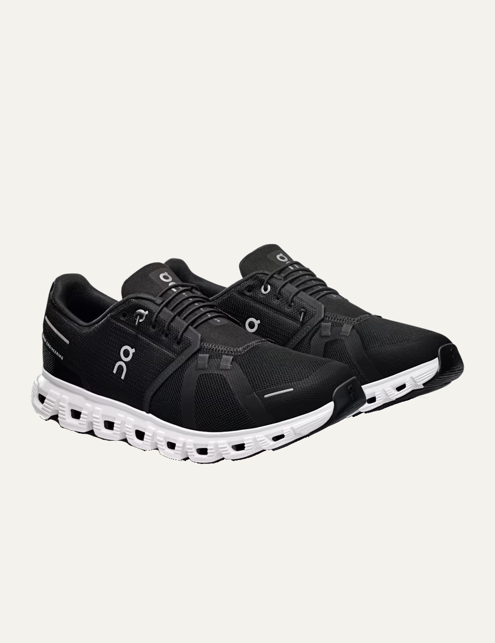 On Cloud running sneakers black angled view