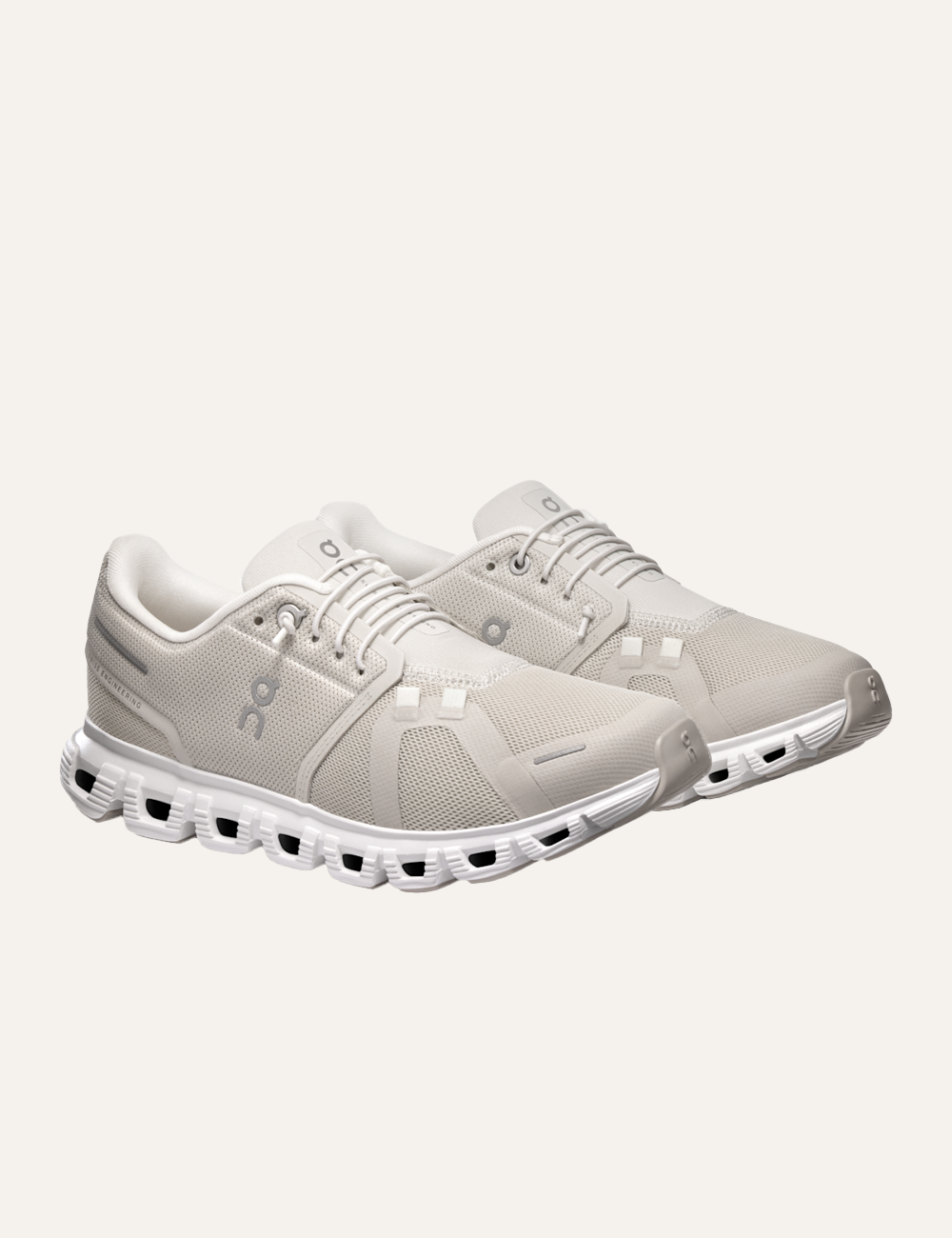 On Cloud running sneakers light beige angled view