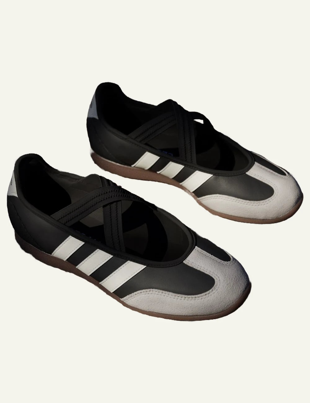 Adidas Originals leather sneakers core black core white gum strap detail top view