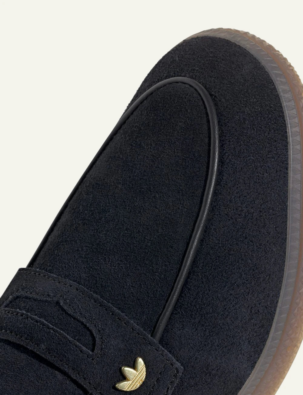 Men's adidas Originals Handball Spezial Loafer in black suede with strap closure and gum rubber sole angled