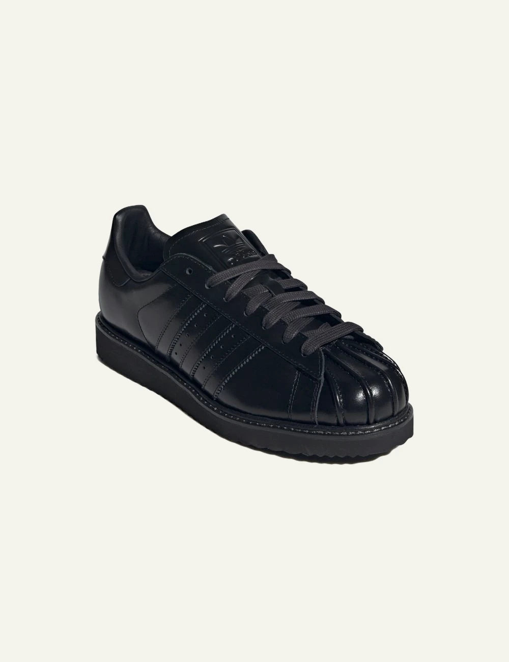 Women's adidas Originals Superstar Lux black leather sneakers with shell toe and platform-inspired sole front