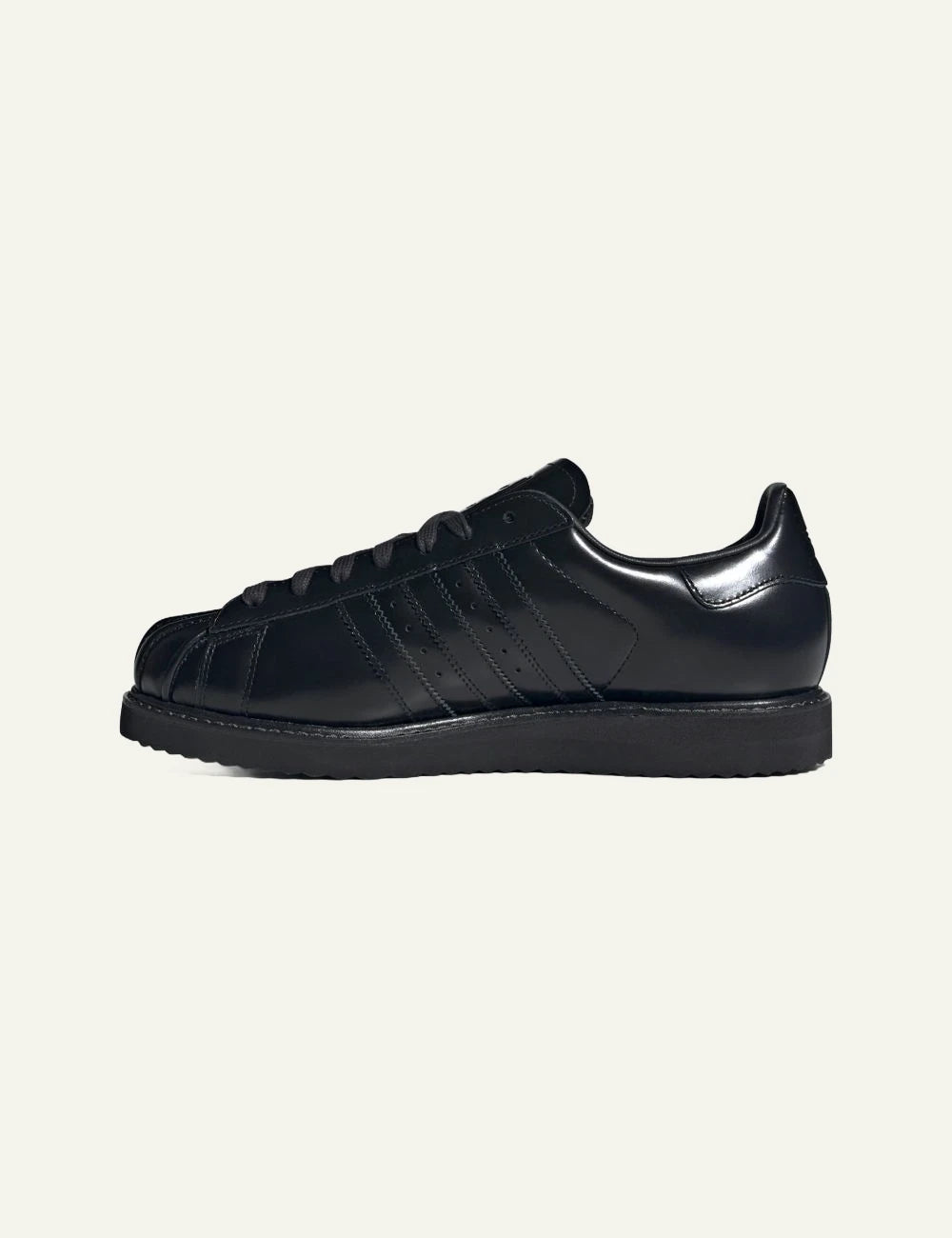 Women's adidas Originals Superstar Lux black leather sneakers with shell toe and platform-inspired sole side