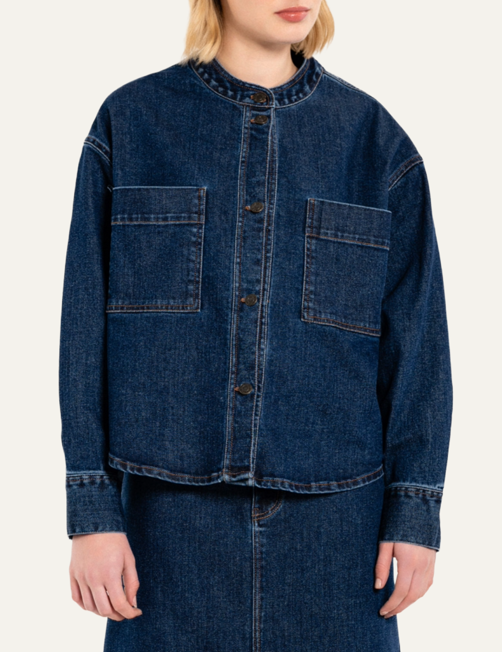 Philosophy mid-blue cropped denim jacket with round neckline, button closure and large front patch pockets front view on model