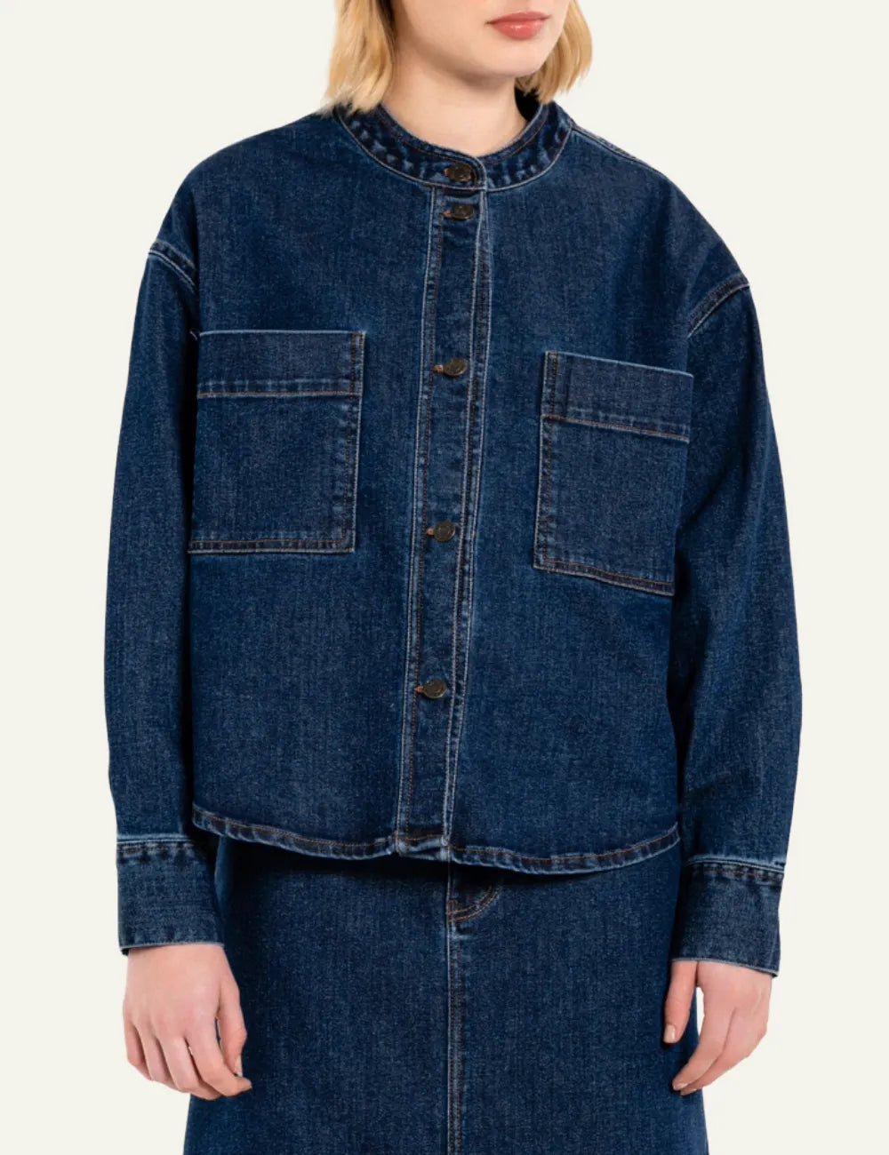 Philosophy mid-blue cropped denim jacket with round neckline, button closure and large front patch pockets front view on model