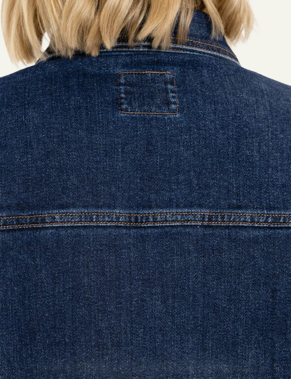 Philosophy mid-blue oversized denim overshirt with button closure, classic collar and front vertical pockets close up detail back