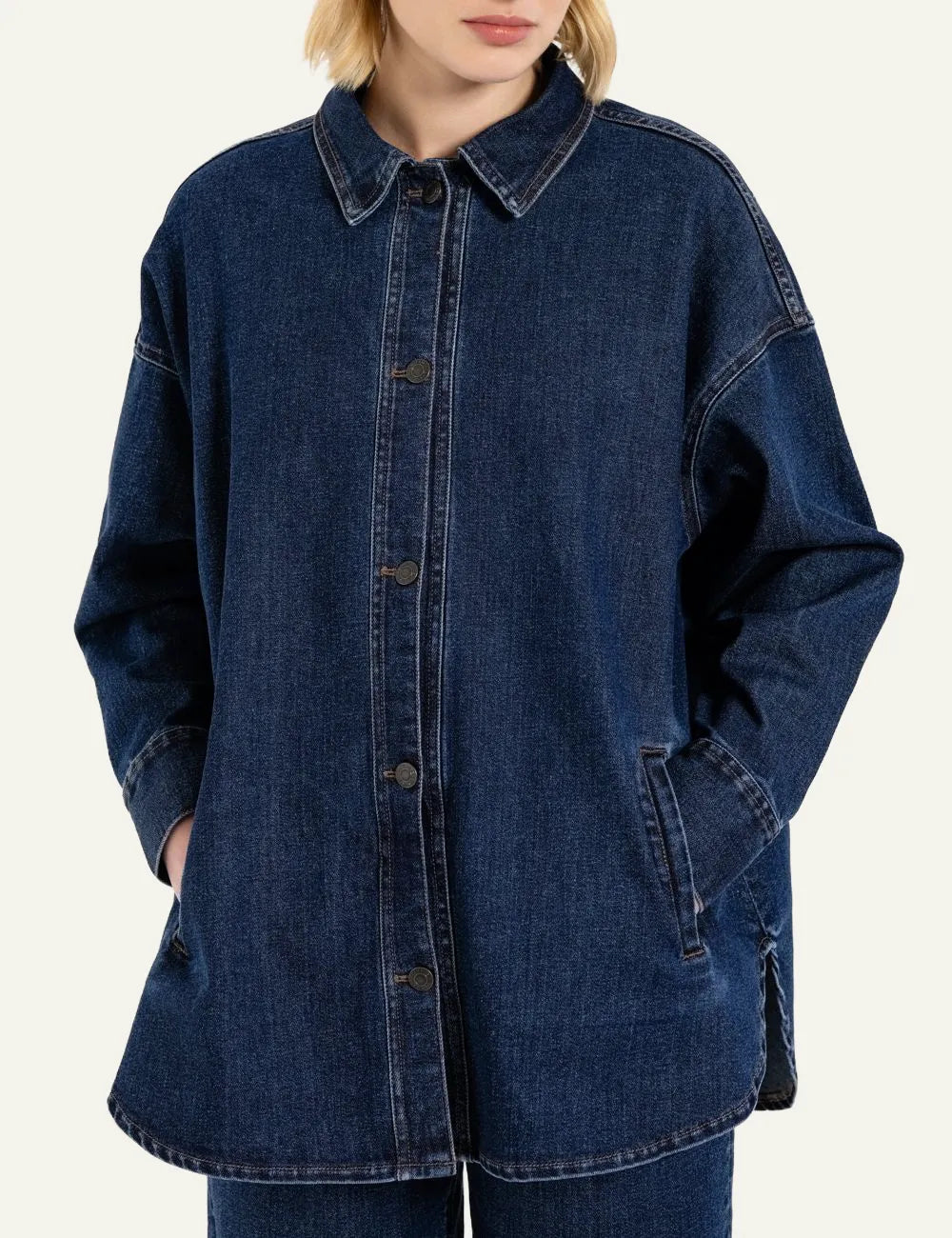 Philosophy mid-blue oversized denim overshirt with button closure, classic collar and front vertical pockets close up front model