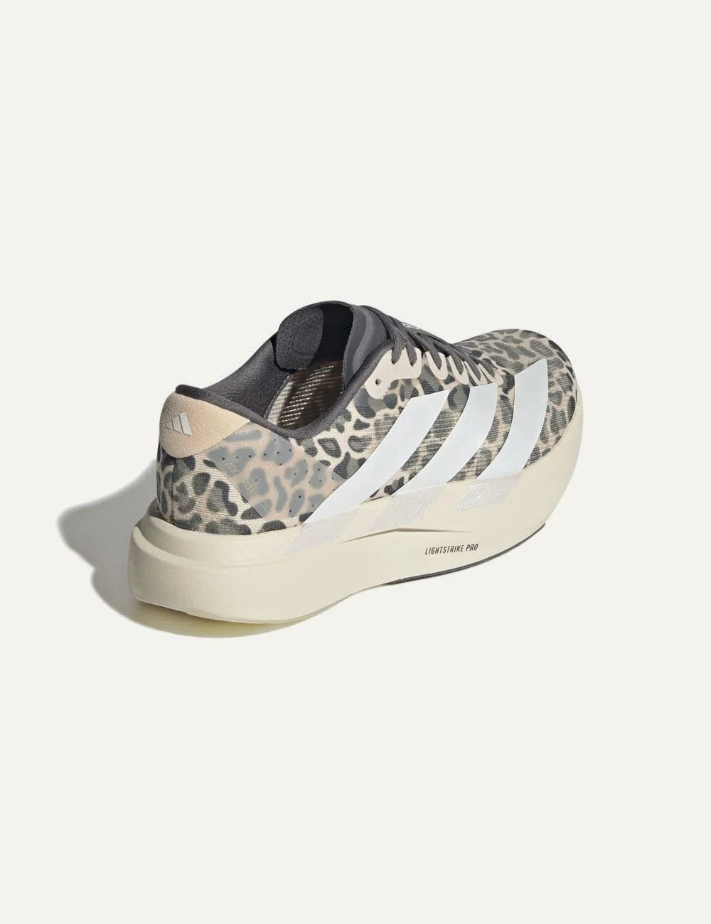 Adidas Adizero EVO SL sneaker beige me white stripes angled back view