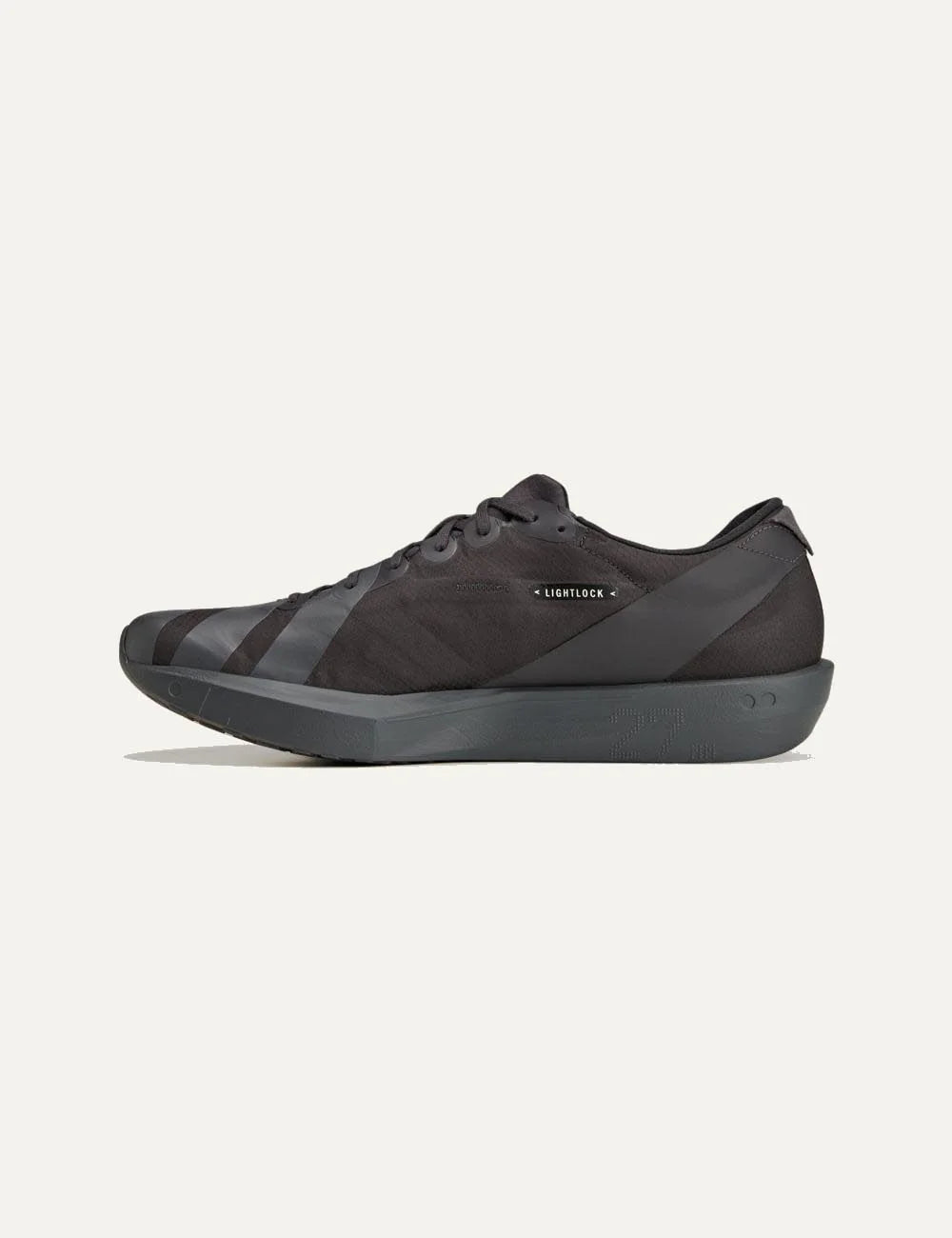 Y-3 Adios 9 sneaker black me off white stripes profile view